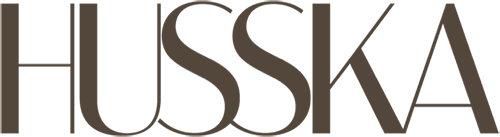 The logo of Em Prové's client, Husska