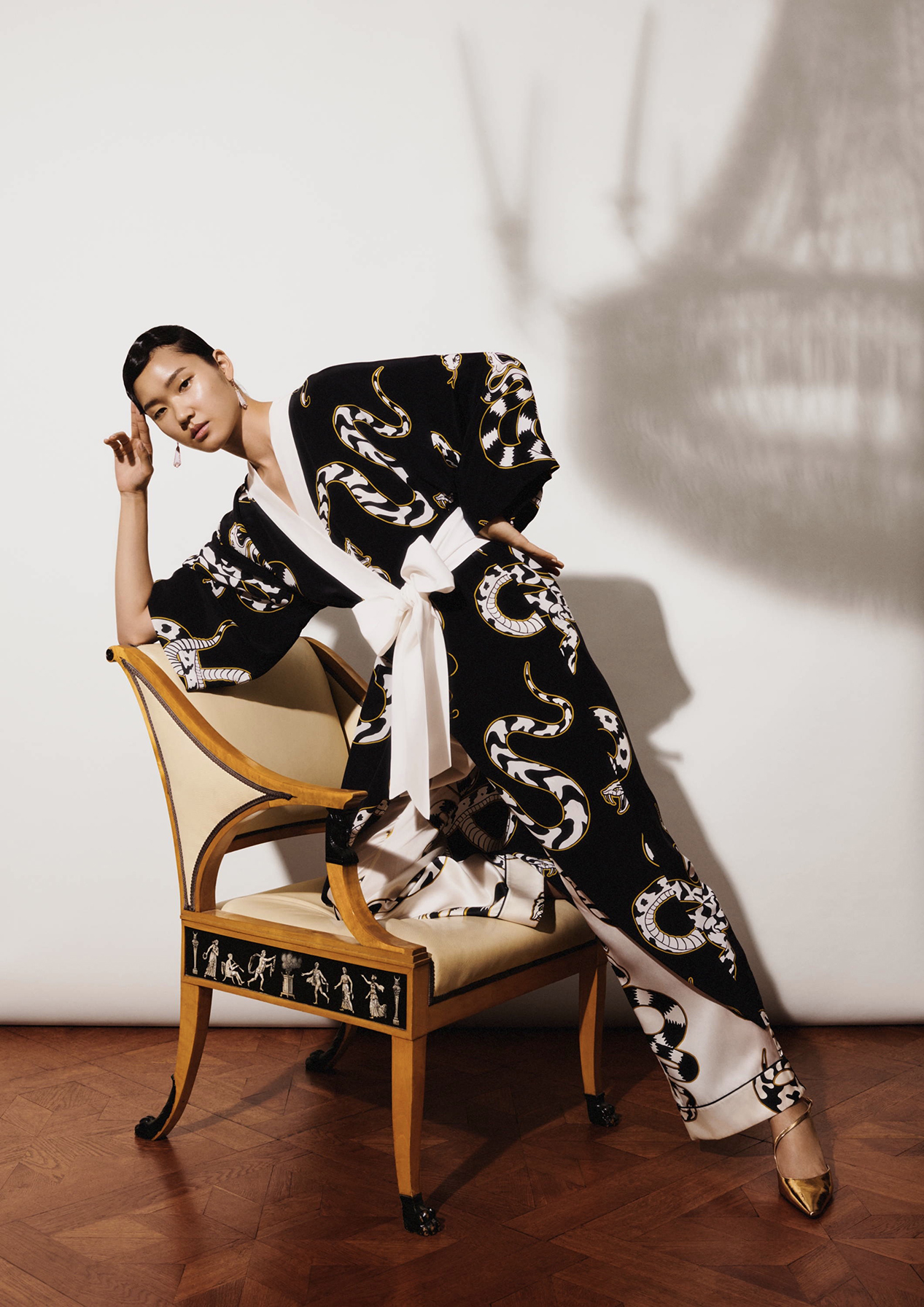 Iconic snake print, hand painted by Em Prové for Olivia von Halle's luxury sleepwear